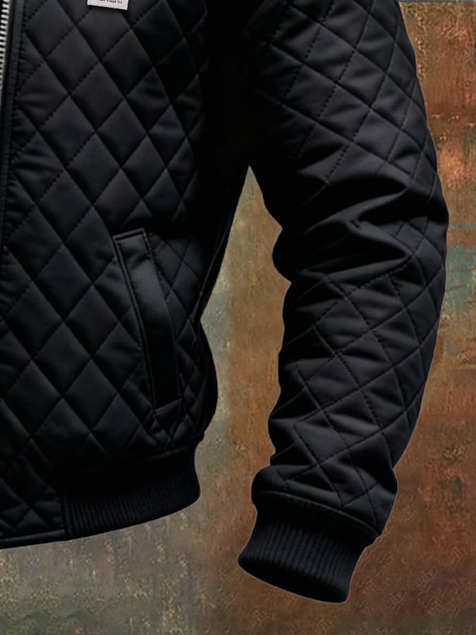 Adrian - Black quilted jacket with leather sleeves